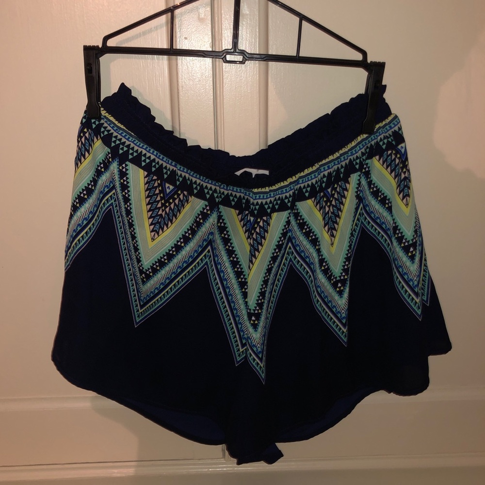 Navy shorts with colorful designs
